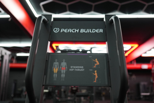 Тяга бедра стоя серии Peach Builder PB402 тренажер на свободных весах